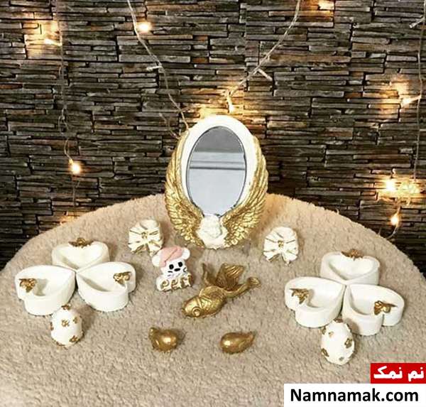 تزیین سفره هفت سین طرح قلب طلایی رنگ نوروز امسال