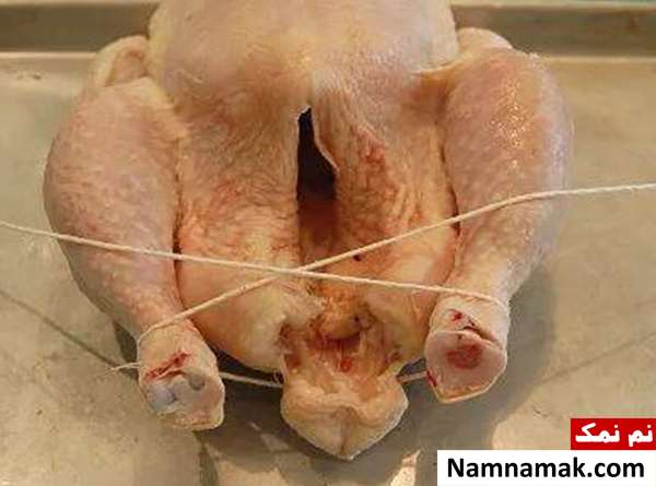 طرز بستن مرغ شکم پر به صورت مرحله به مرحله + تصاویر طرز بستن مرغ شکم پر