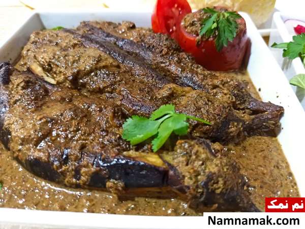 طرز تهیه بادمجان شکم پر شمالی بدون گوشت با گردو و رب انار
