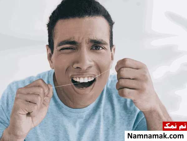 نخ دندون میکشم بو میده
