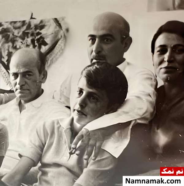 زندگینامه محمود خوردبین و همسرش کودکی محمود خوردبین در آغوش پدرش