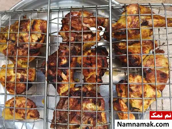 جوجه کباب روی توری